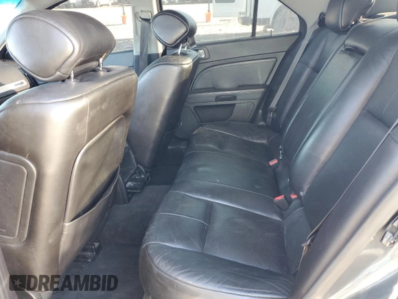 2009 Cadillac STS RWD z VIN 1G6DW67V390104597, wystawiony jako Copart lot #73794724 z przebiegiem Nie podano mil oraz Szkoda całkowita • Salvage title. Historia ofert i sprzedaży dostępna na DreamBid. Obrazek 10.