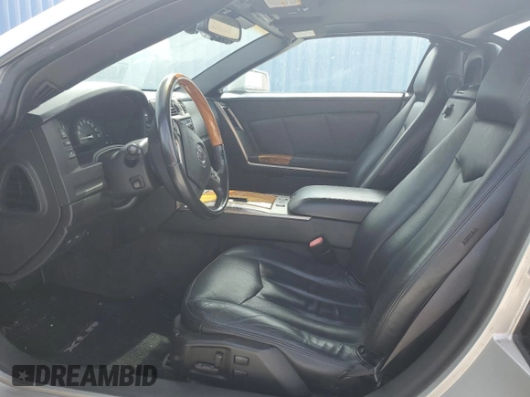 2004 Cadillac XLR z VIN 1G6YV34A945601007, wystawiony jako Copart lot #77077394 z przebiegiem Nie podano mil oraz Szkody całkowita. Historia ofert i sprzedaży dostępna na DreamBid. Obrazek 7.