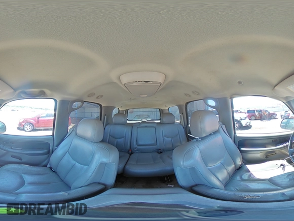 2003 Chevrolet Tahoe LT with VIN 1GNEC13ZX3R111532, listed as a Copart auction lot 63007715 with 259,010 mi miles and Salvage title. Bid and sale history available at DreamBid. Image 14.