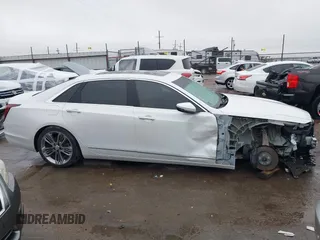 2019 Cadillac CT6 Luxury AWD z VIN 1G6KB5RS9KU114954, wystawiony jako IAAI lot #38260808 z przebiegiem 17 666 mil mil oraz . Historia ofert i sprzedaży dostępna na DreamBid. Obrazek 14.