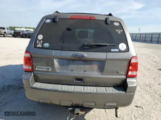 2010 Ford Escape XLT with VIN 1FMCU0DG6AKD05058, listed as a Copart auction lot 50449035 with 127,781 mi miles and Salvage Title. Bid and sale history available at carsss.com. Image 6.