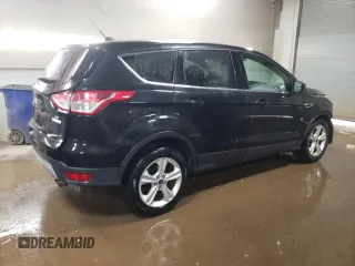 2015 Ford Escape SE with VIN 1FMCU0GX4FUC57258, listed as a Copart auction lot 51085685 with 216,724 mi miles and Salvage Title. Bid and sale history available at DreamBid. Image 3.