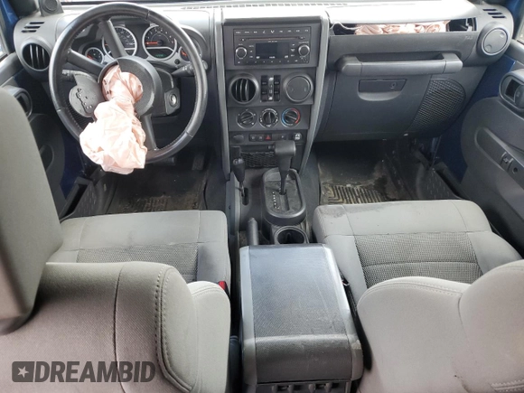 2009 Jeep Wrangler Unlimited Rubicon with VIN 1J4GA69199L713060, listed as a Copart auction lot 58543595 with 159,981 mi miles and Clean title. Bid and sale history available at DreamBid. Image 8.