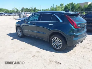 2025 Cadillac XT4 FWD Premium Luxury z VIN 1GYFZCR47SF146106, wystawiony jako IAAI lot #42324320 z przebiegiem 4 601 mil mil oraz . Historia ofert i sprzedaży dostępna na DreamBid. Obrazek 3.