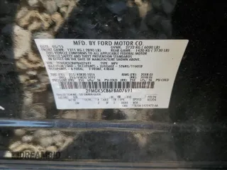 2015 Ford Flex SEL z VIN 2FMGK5C86FBA07691, wystawiony jako Copart lot #53474675 z przebiegiem 176 085 mil mil oraz Szkody całkowita. Historia ofert i sprzedaży dostępna na DreamBid. Obrazek 13.