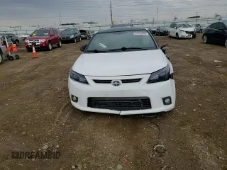 2012 Scion tC z VIN JTKJF5C71C3032427, wystawiony jako Copart lot #54160695 z przebiegiem 59 826 mil mil oraz Szkoda całkowita • Salvage title. Historia ofert i sprzedaży dostępna na DreamBid. Obrazek 14.