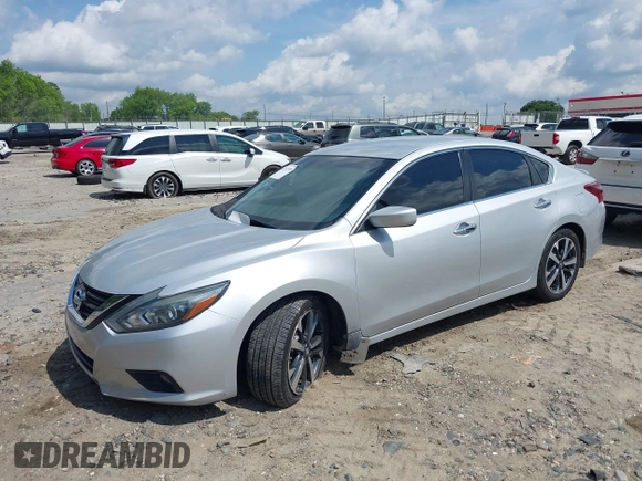 2017 Nissan Altima SR z VIN 1N4AL3AP8HC257299, wystawiony jako IAAI lot #42312909 z przebiegiem 50 154 mil mil oraz . Historia ofert i sprzedaży dostępna na DreamBid. Obrazek 17.