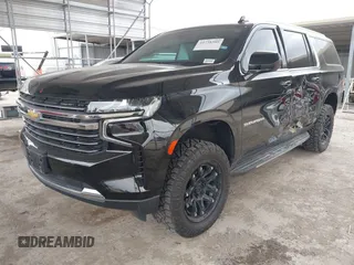 2021 Chevrolet Suburban LT z VIN 1GNSCCKDXMR421833, wystawiony jako IAAI lot #41738389 z przebiegiem 56 757 mil mil oraz . Historia ofert i sprzedaży dostępna na DreamBid. Obrazek 2.