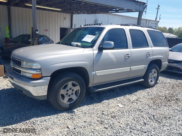 2004 Chevrolet Tahoe LT with VIN 1GNEC13Z34J304556, listed as a IAAI auction lot 41911229 with 275,494 mi miles. Bid and sale history available at carsss.com. Image 2.