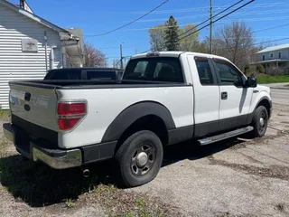 2009 Ford F-150 STX with VIN 1FTRX12879FA71573, listed as a Copart auction lot 56188705 with 228,051 mi miles and Clean Title. Bid and sale history available at DreamBid. Image 4.