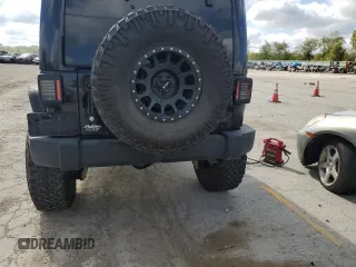 2014 Jeep Wrangler Unlimited Rubicon X с VIN 1C4HJWFG0EL142071, выставлен на аукционе Copart как лот 72898994 с пробегом 110 597 миль миль и Списание • Salvage title. История ставок и продаж доступна на DreamBid. Изображение 6.