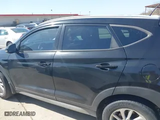 2017 Hyundai Tucson Value with VIN KM8J33A28HU302472, listed as a IAAI auction lot 41717598 with 126,438 mi miles. Bid and sale history available at carsss.com. Image 14.