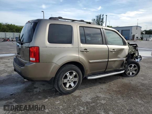 2010 Honda Pilot Touring with VIN 5FNYF3H81AB016255, listed as a Copart auction lot 71052644 with 96,847 mi miles and Salvage Title. Bid and sale history available at DreamBid. Image 3.