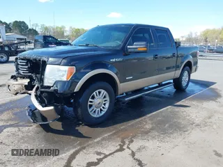 2014 Ford F-150 XL with VIN 1FTFW1CT7EKD23140, listed as a IAAI auction lot 41875745 with 215,619 mi miles and . Bid and sale history available at DreamBid. Image 2.