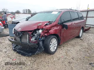2014 Toyota Sienna XLE z VIN 5TDYK3DC9ES425398, wystawiony jako IAAI lot #41551678 z przebiegiem 224 667 mil mil oraz . Historia ofert i sprzedaży dostępna na DreamBid. Obrazek 2.
