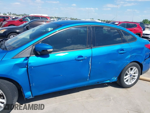 2015 Ford Focus SE with VIN 1FADP3F21FL379837, listed as a IAAI auction lot 42021623 with 146,571 mi miles. Bid and sale history available at carsss.com. Image 6.