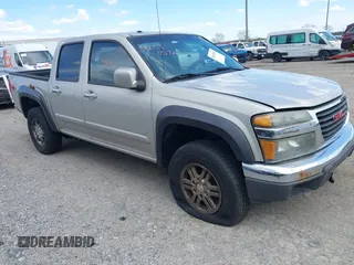 2009 GMC Canyon SLE1 z VIN 1GTDT13E398100890, wystawiony jako IAAI lot #42030572 z przebiegiem 160 181 mil mil oraz . Historia ofert i sprzedaży dostępna na DreamBid. Obrazek 1.