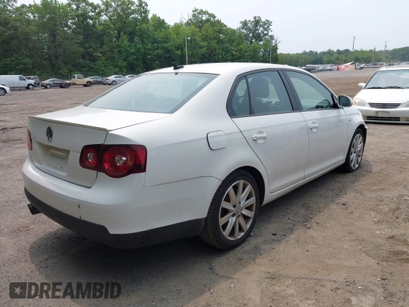 2010 Volkswagen Jetta Wolfsburg Edition with VIN 3VWRJ7AJ5AM015058, listed as a IAAI auction lot 42428766 with 158,506 mi miles and . Bid and sale history available at DreamBid. Image 4.