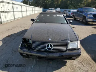 1999 Mercedes-Benz SL-Class with VIN WDBFA68F1XF184891, listed as a Copart auction lot 77082284 with 96,379 mi miles and Salvage Title. Bid and sale history available at carsss.com. Image 5.