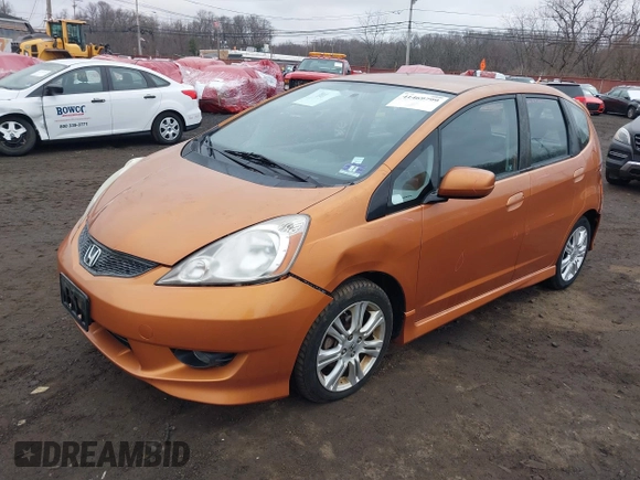 2010 Honda Fit Sport with VIN JHMGE8H63AS024532, listed as a IAAI auction lot 41469799 with 167,750 mi miles and . Bid and sale history available at DreamBid. Image 2.