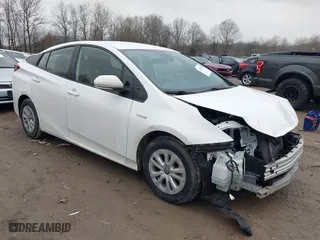 2021 Toyota Prius L Eco with VIN JTDKAMFU1M3149867, listed as a IAAI auction lot 41417036 with 84,421 mi miles. Bid and sale history available at carsss.com. Image 1.