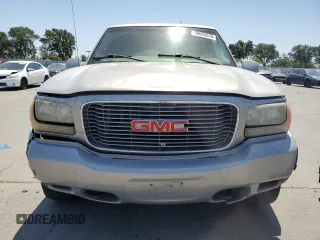 1999 GMC Denali z VIN 1GKEK13R6XR914411, wystawiony jako Copart lot #56063555 z przebiegiem 231 344 mil mil oraz Szkoda całkowita • Salvage title. Historia ofert i sprzedaży dostępna na DreamBid. Obrazek 5.