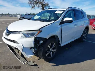 2018 Toyota RAV4 XLE with VIN 2T3WFREV8JW425027, listed as a IAAI auction lot 41272635 with 79,445 mi miles. Bid and sale history available at carsss.com. Image 2.