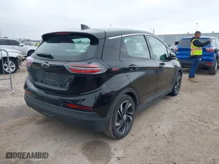 2023 Chevrolet Bolt EV 2LT with VIN 1G1FX6S02P4143467, listed as a IAAI auction lot 41607322 with 95,398 mi miles. Bid and sale history available at carsss.com. Image 4.