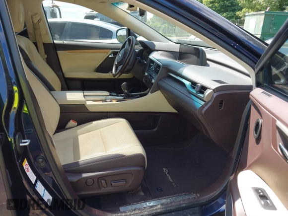 2016 Lexus RX 350 with VIN JTJBZMCA2G2001429, listed as a IAAI auction lot 42202436 with Not provided miles and . Bid and sale history available at DreamBid. Image 5.