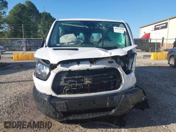 2019 Ford Transit with VIN 1FTYE1YM8KKB45313, listed as a IAAI auction lot 40529305 with 157,433 mi miles and . Bid and sale history available at DreamBid. Image 12.