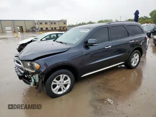 2013 Dodge Durango Crew with VIN 1C4RDHDG2DC699654, listed as a Copart auction lot 64559495 with 277,293 mi miles and Salvage title. Bid and sale history available at DreamBid. Image 1.