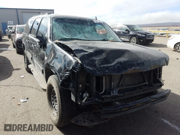 2012 Chevrolet Suburban LT with VIN 1GNSCJE05CR146514, listed as a Copart auction lot 28413650 with 230,681 mi miles and Salvage Title. Bid and sale history available at carsss.com. Image 1.