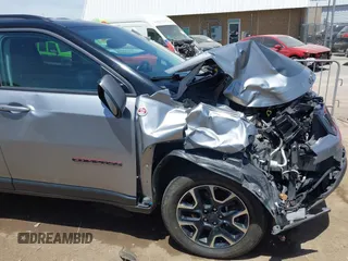 2020 Jeep Compass Trailhawk with VIN 3C4NJDDB7LT159532, listed as a IAAI auction lot 42243833 with 118,566 mi miles and . Bid and sale history available at DreamBid. Image 6.