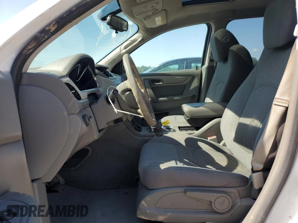 2017 Chevrolet Traverse LS with VIN 1GNKRFED8HJ114385, listed as a Copart auction lot 61221945 with 99,572 mi miles and Salvage title. Bid and sale history available at DreamBid. Image 7.