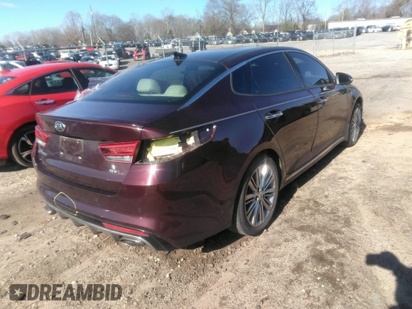 2016 Kia Optima SXL Turbo with VIN 5XXGV4L2XGG085829, listed as a IAAI auction lot 41789911 with 50,958 mi miles. Bid and sale history available at carsss.com. Image 4.