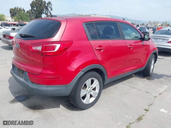 2013 Kia Sportage LX with VIN KNDPBCA26D7355889, listed as a IAAI auction lot 42054415 with 136,859 mi miles. Bid and sale history available at carsss.com. Image 4.