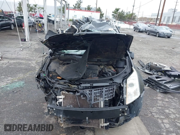 2015 Cadillac SRX with VIN 3GYFNAE36FS573940, listed as a IAAI auction lot 41808779 with Not Provided miles and . Bid and sale history available at DreamBid. Image 11.