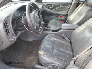 2003 Pontiac Bonneville SE z VIN 1G2HX52K534102213, wystawiony jako Copart lot #41921295 z przebiegiem 136 422 mil mil oraz Szkoda całkowita • Salvage title. Historia ofert i sprzedaży dostępna na DreamBid. Obrazek 7.