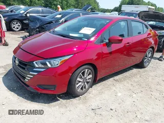 2023 Nissan Versa SV with VIN 3N1CN8EV6PL830418, listed as a IAAI auction lot 42393064 with 19,414 mi miles and . Bid and sale history available at DreamBid. Image 2.