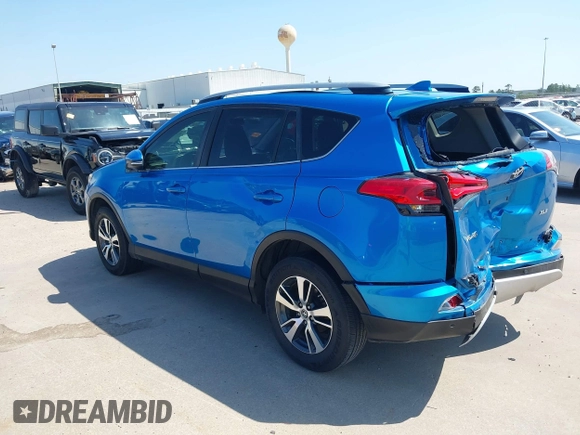 2018 Toyota RAV4 XLE with VIN JTMWFREV2JJ168557, listed as a IAAI auction lot 41994837 with 107,636 mi miles. Bid and sale history available at carsss.com. Image 3.
