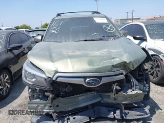 2019 Subaru Forester Premium with VIN JF2SKAEC4KH451448, listed as a IAAI auction lot 42279690 with 99,219 mi miles and . Bid and sale history available at DreamBid. Image 13.