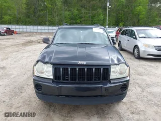 2005 Jeep Grand Cherokee Laredo with VIN 1J4GS48K65C570266, listed as a IAAI auction lot 42026624 with 162,512 mi miles. Bid and sale history available at carsss.com. Image 6.