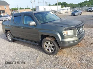 2006 Honda Ridgeline RTL with VIN 2HJYK16526H544134, listed as a IAAI auction lot 42732938 with 309,586 mi miles and . Bid and sale history available at DreamBid. Image 1.