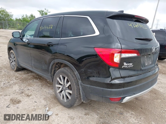 2020 Honda Pilot EX-L with VIN 5FNYF6H57LB059332, listed as a IAAI auction lot 42614422 with 110,279 mi miles and . Bid and sale history available at DreamBid. Image 3.