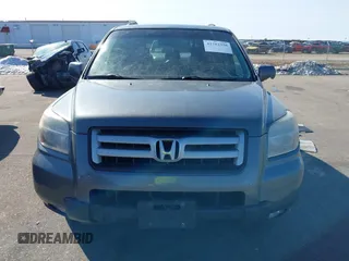 2007 Honda Pilot EX-L with VIN 2HKYF18667H501911, listed as a IAAI auction lot 41752356 with 267,277 mi miles and . Bid and sale history available at DreamBid. Image 12.