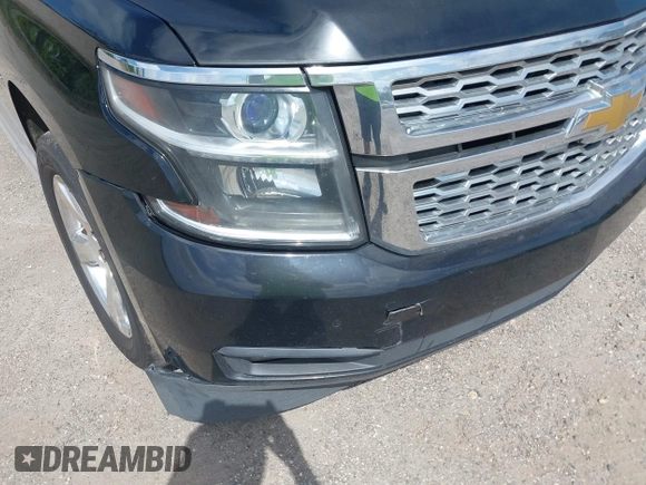 2015 Chevrolet Tahoe LT with VIN 1GNSCBKC1FR615817, listed as a IAAI auction lot 41760474 with 242,148 mi miles and . Bid and sale history available at DreamBid. Image 6.