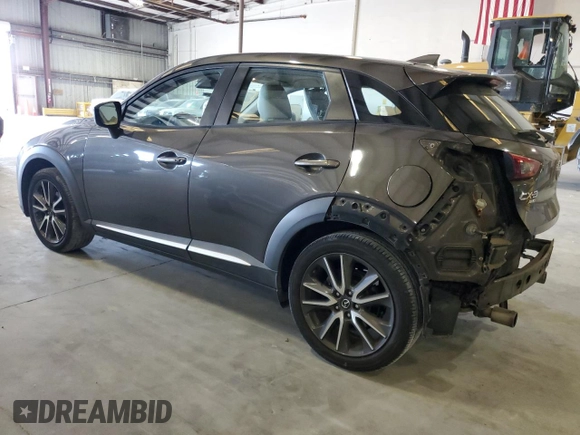 2017 Mazda CX-3 Grand Touring z VIN JM1DKFD74H0163736, wystawiony jako Copart lot #57871265 z przebiegiem 212 515 mil mil oraz Szkody całkowita. Historia ofert i sprzedaży dostępna na DreamBid. Obrazek 2.
