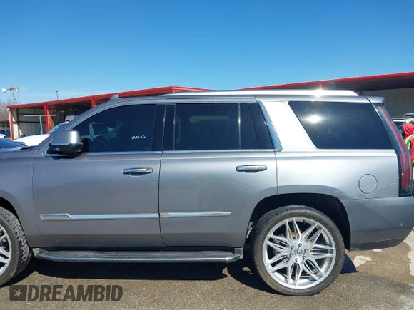 2018 Cadillac Escalade Luxury z VIN 1GYS3BKJ0JR147752, wystawiony jako IAAI lot #41419140 z przebiegiem 124 376 mil mil oraz . Historia ofert i sprzedaży dostępna na DreamBid. Obrazek 15.