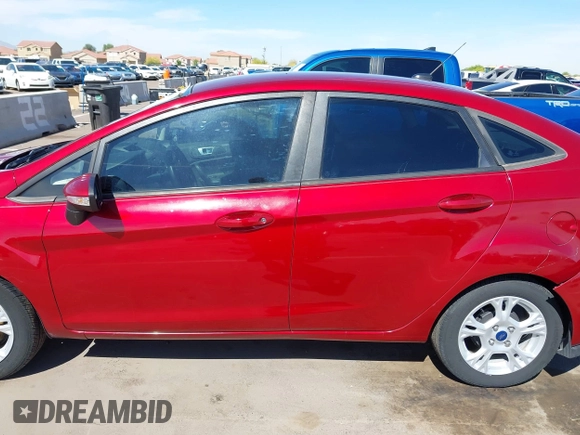 2015 Ford Fiesta SE with VIN 3FADP4BJ4FM149307, listed as a IAAI auction lot 42078091 with 124,529 mi miles. Bid and sale history available at carsss.com. Image 14.