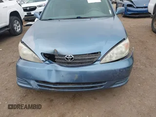 2004 Toyota Camry LE with VIN 4T1BF32K54U572537, listed as a IAAI auction lot 41850322 with 167,076 mi miles and . Bid and sale history available at DreamBid. Image 6.